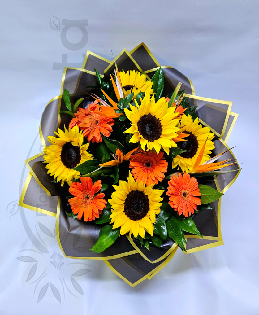 Arreglo girasoles, gerberas, aves del paraiso