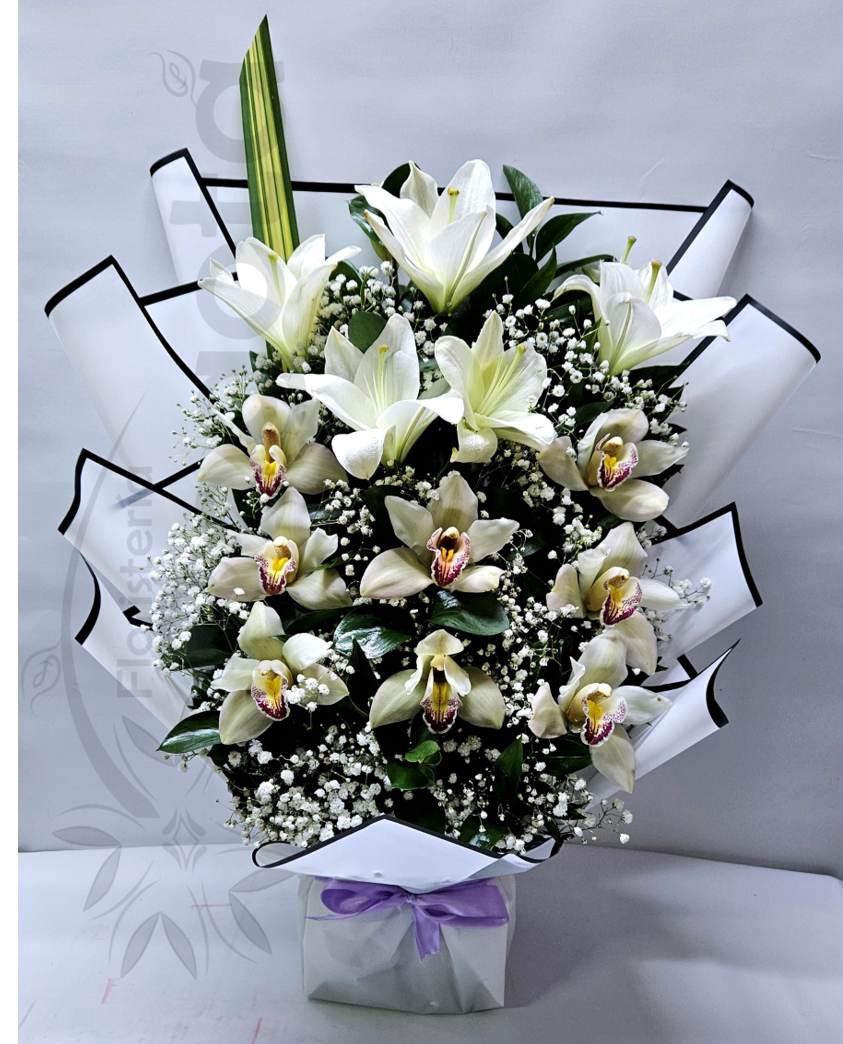 Arreglo orquideas y lirios